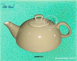 Teapot with cream glaze